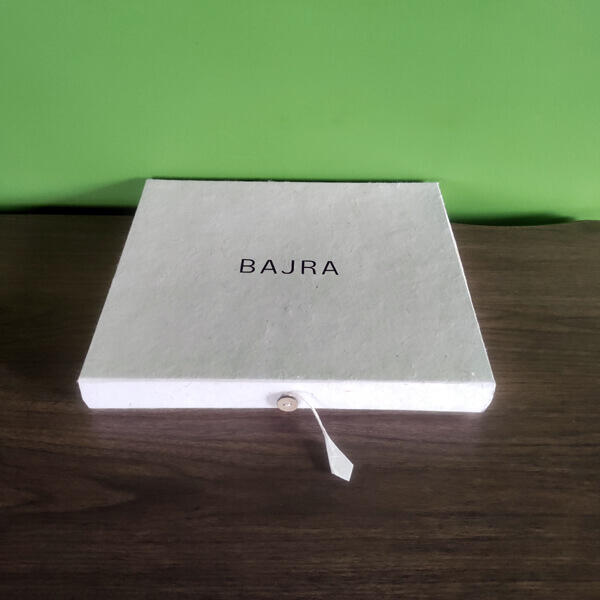 Your cashmere shawl is placed in a sustainable paper pouch & presented in a hand-made protective gift box made from Lokta Paper.