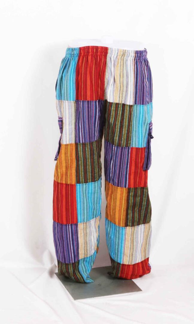 Discover Handmade Boho Patchwork Pants made with sustainable practices and comfortable cotton materials. unique and colorful unisex pants - full back view.