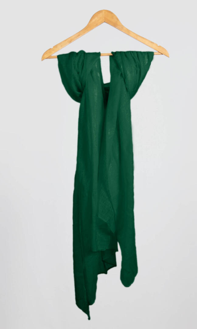 100% Pure Forest Green Cashmere Shawl Handmade hanging from a coat hanger to display its full length.