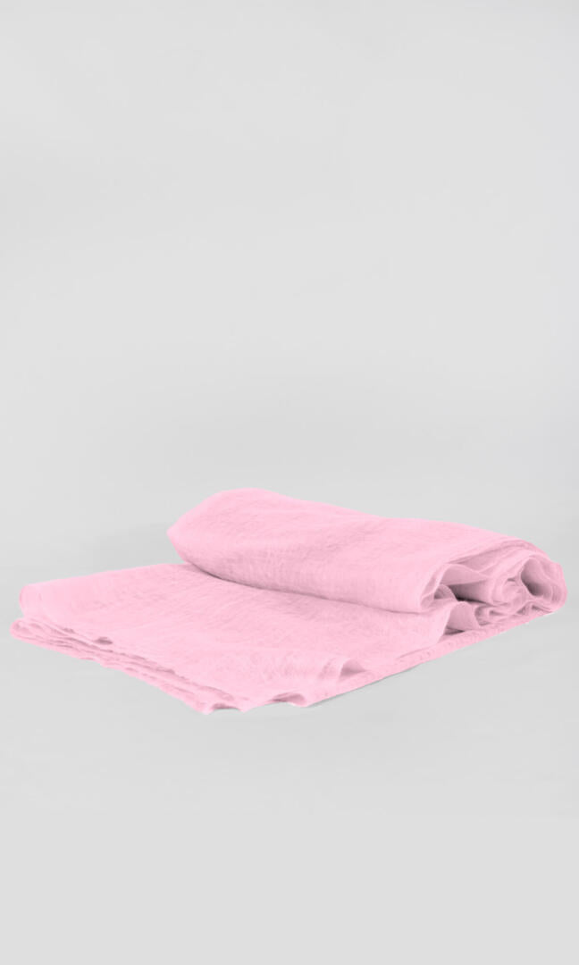 Close-up of the premium handwoven 100% pure Baby Pink cashmere shawl - a folded view to convey its easy-to-pack feature.
