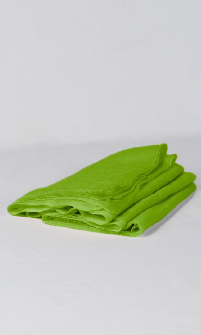 Close-up of the premium handwoven 100% pure Chartreuse Green cashmere shawl - flat folded view to convey its easy-to-pack feature.