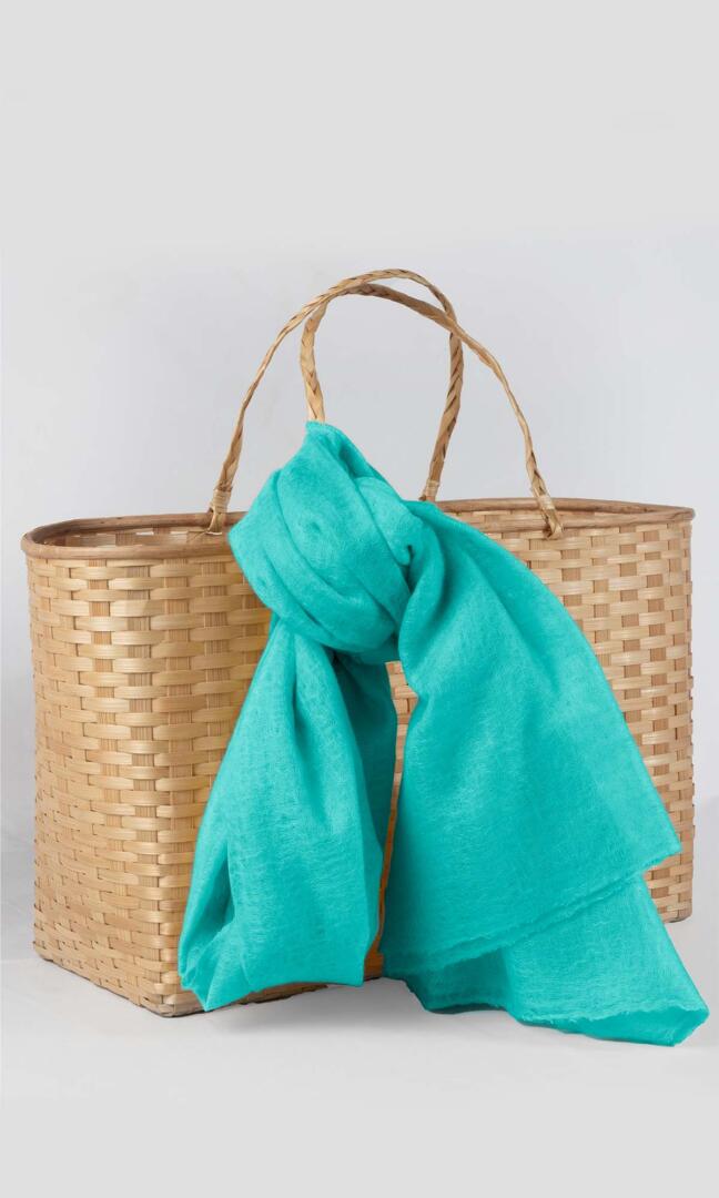 100% Pure Tiffany Blue Cashmere Shawl Handmade, exceptionally soft, lightweight & easy to use as a shawl, wrap, or scarf every day is protective & stylish. A prop view.