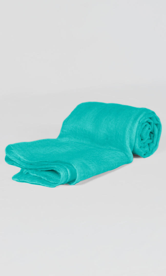 100% Pure Tiffany Blue Cashmere Shawl Handmade, exceptionally soft, lightweight & easy to use as a shawl, wrap, or scarf every day is protective & stylish. A rolled view.