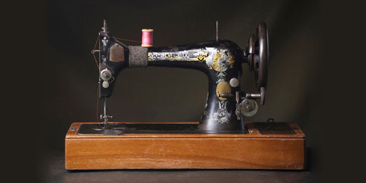 Timeless Craftsmanship: A traditional sewing machine symbolizes the enduring artistry of timeless fashion.
