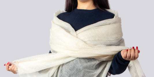 Discover 23 creative ways to style your cashmere shawl for elegance, warmth, and versatility. Elevate your fashion game with these handwoven, ultra-lightweight accessories.