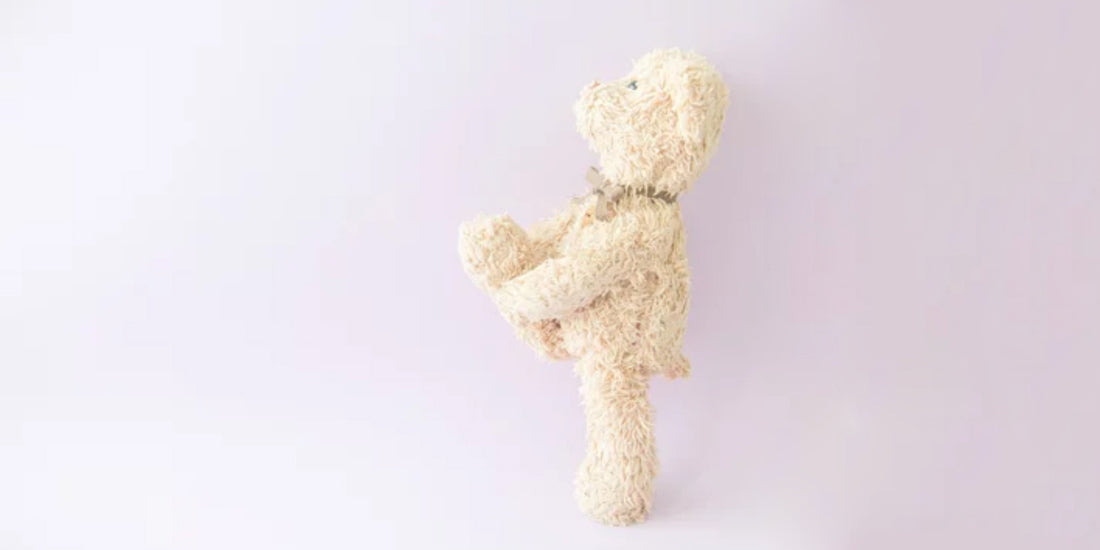 A weighted stuffed animal, a plush toy designed to provide warmth and security through added weight for deep-pressure tactile stimulation, relaxation, and potential therapeutic benefits.