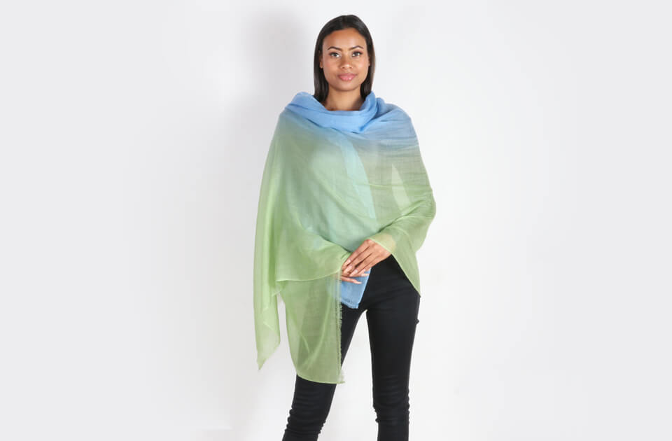 Women's lightweight cashmere shawl in two colors, avocado green and sky blue. It is one of a kind shawl only available at Bajra.