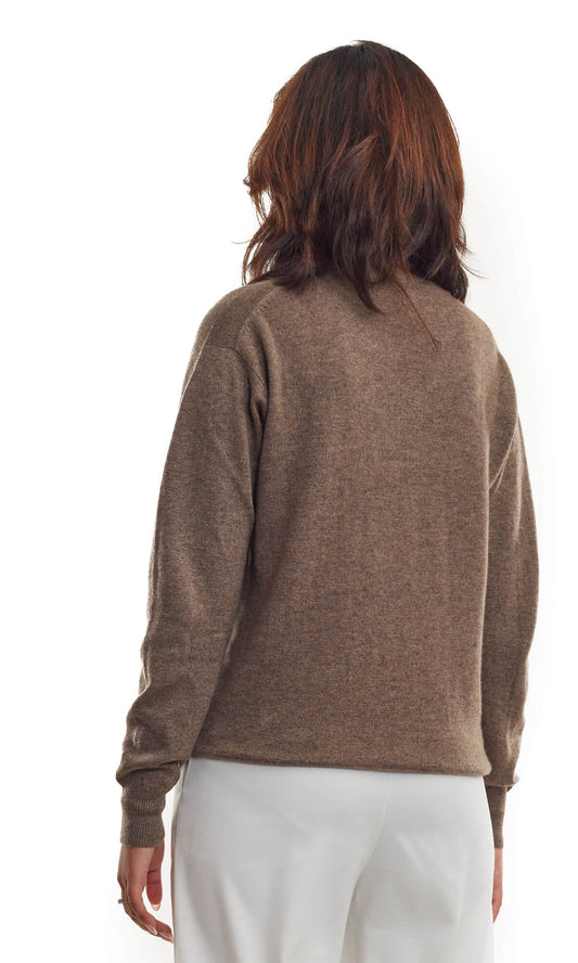 A woman in Rich Coffee Cashmere Cardigan, an essential addition for the season, in pullover-style with a roundneck in relaxed fit; a full back view.