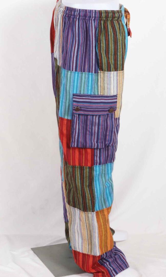 Discover Handmade Boho Patchwork Pants made with sustainable practices and comfortable cotton materials. unique and colorful unisex pants - full side view.