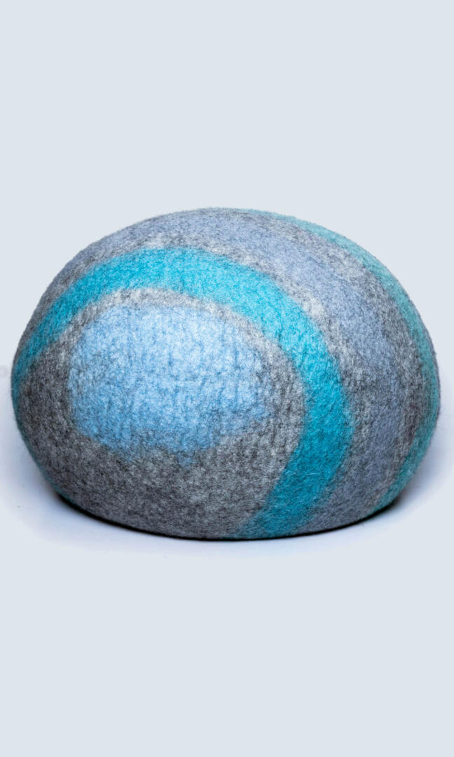 Abstract Oceanic Cat cave house with oval-shaped bed features a gray base with a sky blue & tiffany blue abstract paint-like design and a back view.