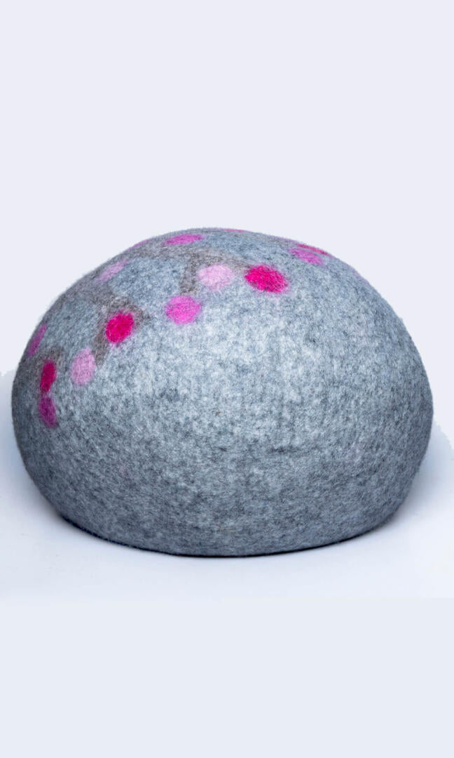 Adorable paw print design cat home, made with premium felted wool, a back view.