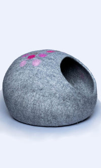 Adorable paw print design cat home, made with premium felted wool, a right side view.