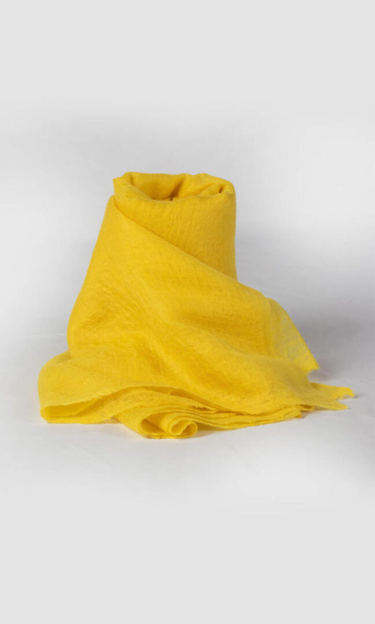 A detailed rolled view of handwoven 100% Pure Emperor Yellow Cashmere Shawl to display a nice pillow look.