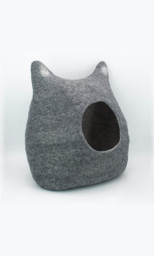 Image of Grey Feline Ear Cat Cave made from premium felted wool, providing a warm and comfortable hideaway for cats with unique cat ear design; a right side view.