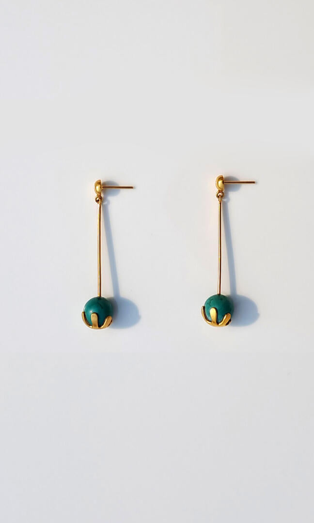 The handcrafted Turquoise Dangle Earrings. Quality, Durability, Versatile & Stylish in 100% brass with 24K double gold plated one-of-a-kind Dangle Earrings - side view.