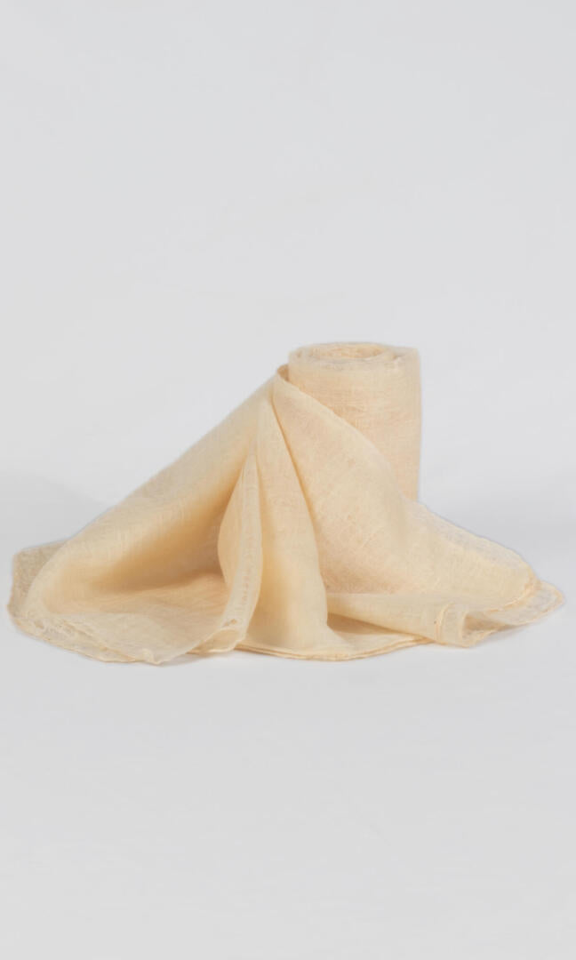 100% Pure Cashmere Shawl Handmade In Wheat Color by women artisans from Nepal is a premium quality cashmere scarf that is super soft to wear all year round.