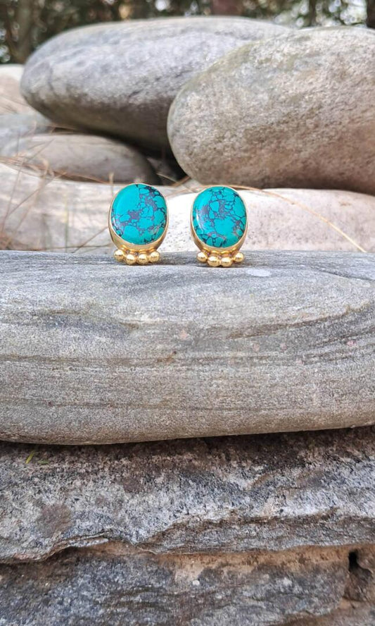 Stunning handcrafted Regal Turquoise Drop Earrings are expertly crafted with genuine, hand-cut turquoise stones.